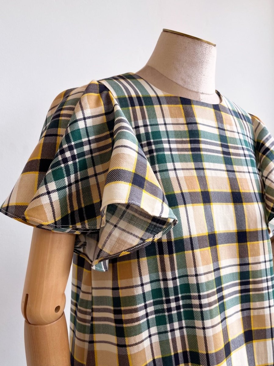 Green, Tan, Yellow, Cream, and Black Plaid Chore Dress with Flutter Sleeve - Made X Hudson