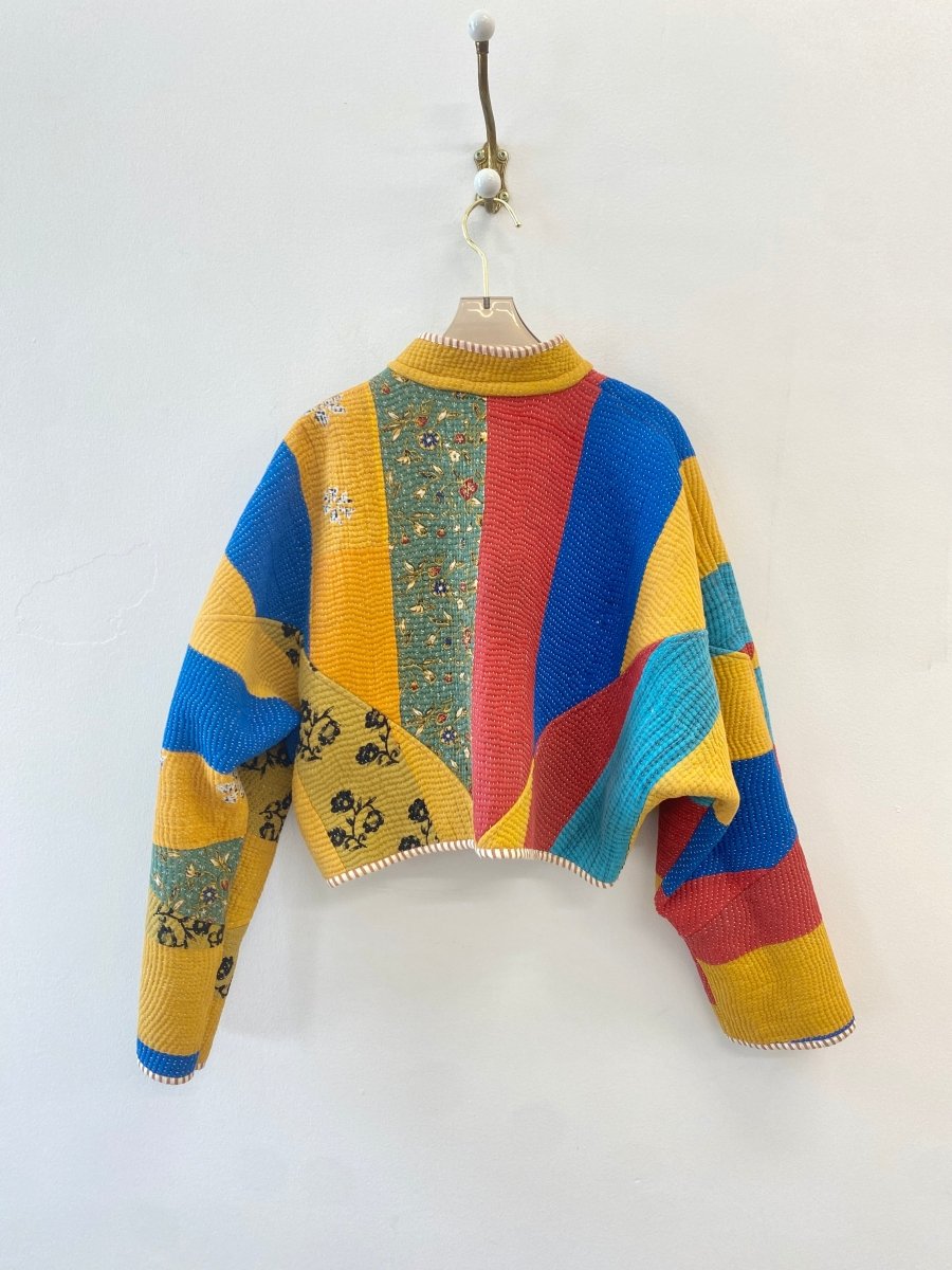 Reversible Kaira Quilted Cropped Jacket in Colors Blue, Yellow, Red, Green w/ Black & White Flowers & Red, Sage Green, Purple & Mustard Floral Patchwork - Made X Hudson