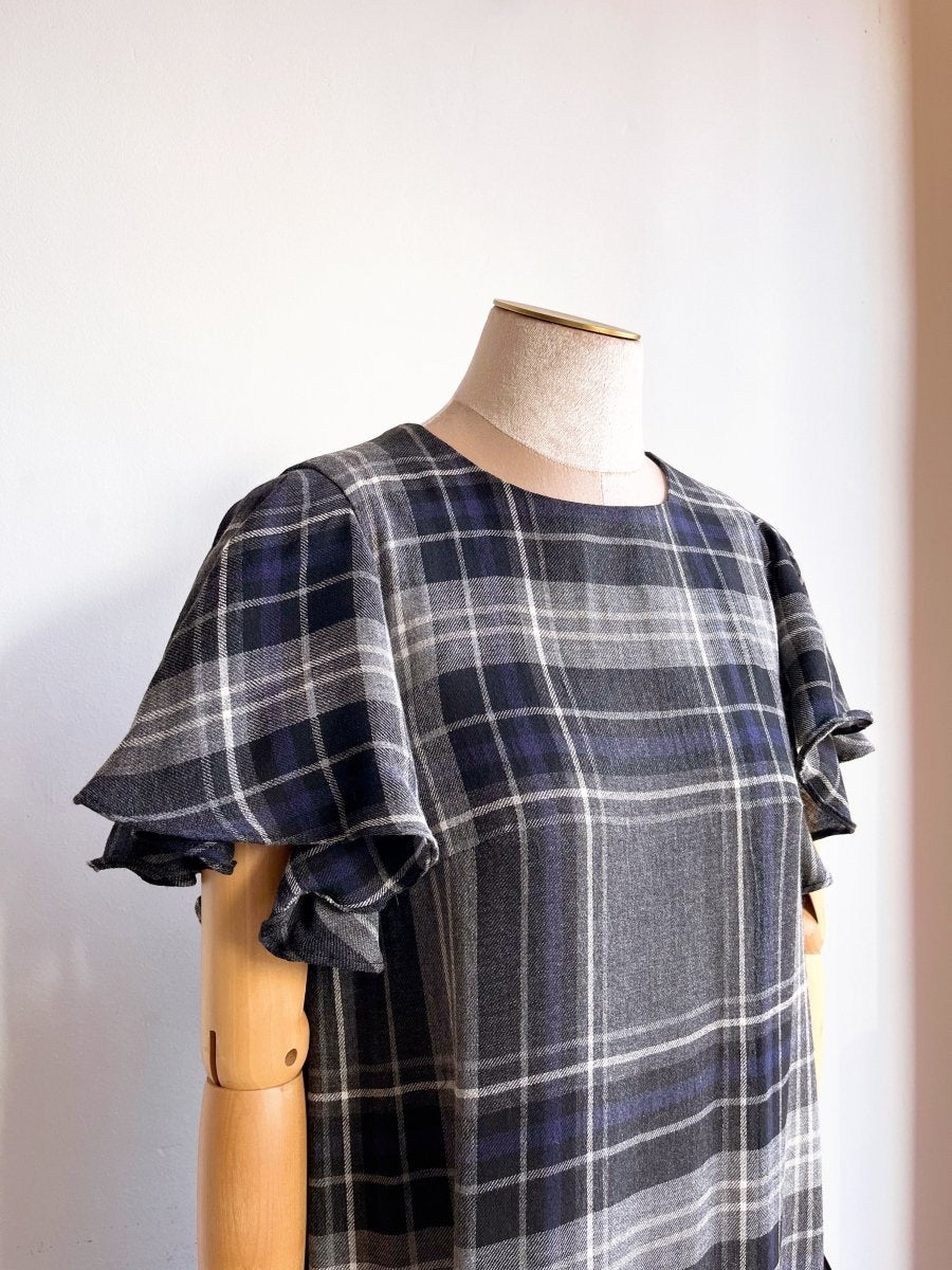 Black, Blue, and Grey Plaid Chore Dress with Flutter Sleeve and Patch Pockets - Made X Hudson