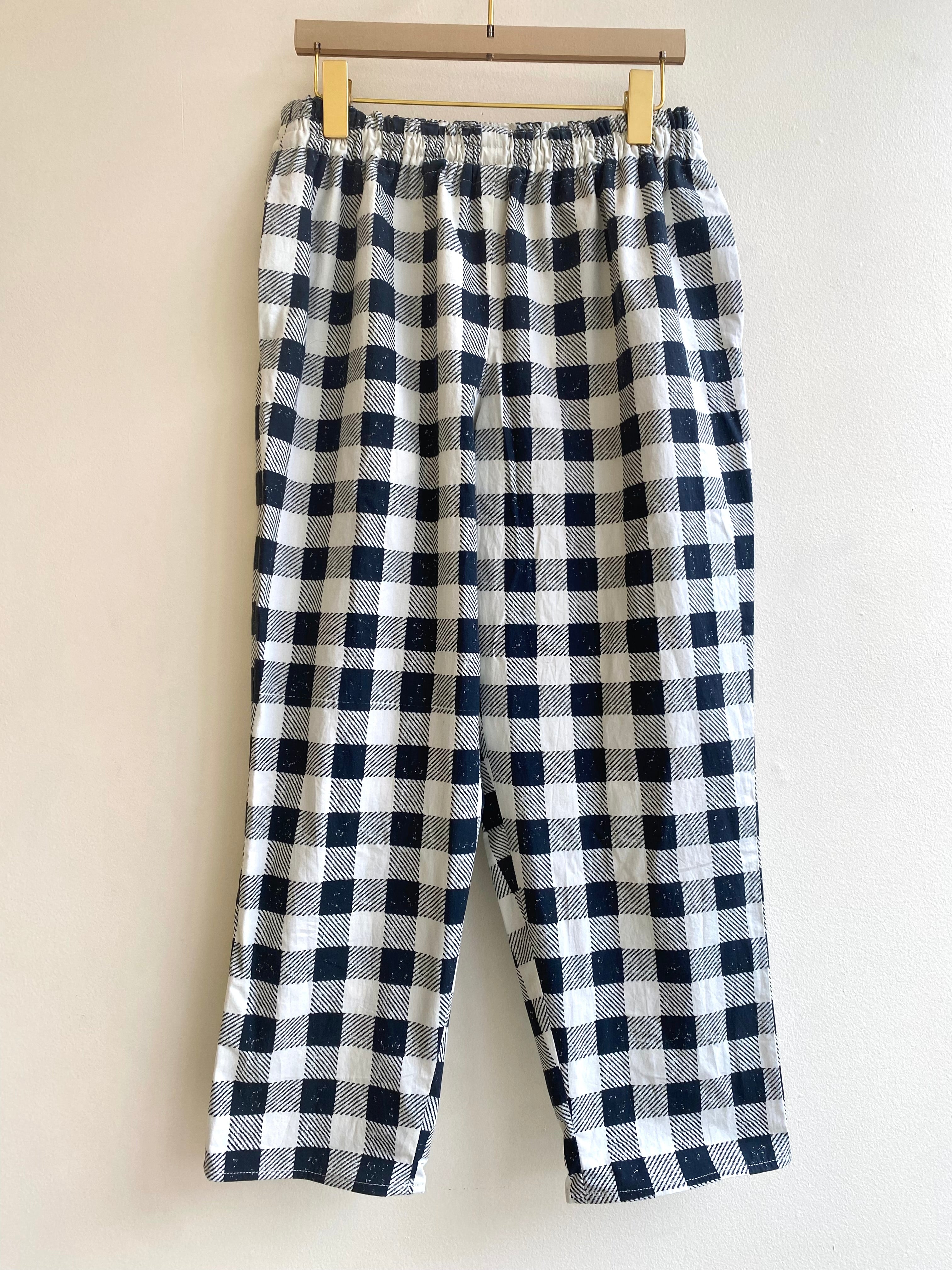 Image of cropped jogger-style pants in black and white large scale gingham checkered print