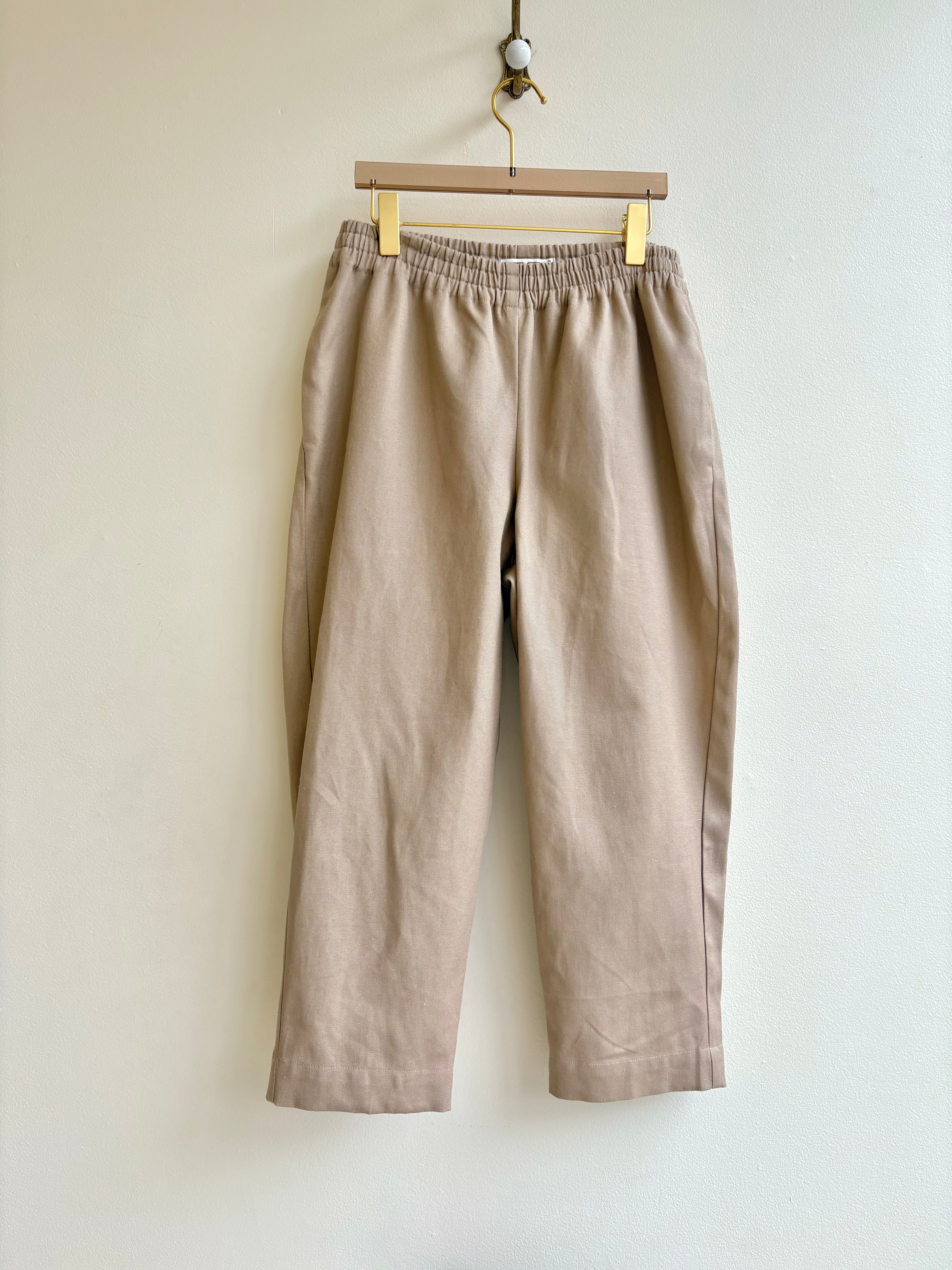 Image of cropped jogger-style pants in khaki cotton canvas