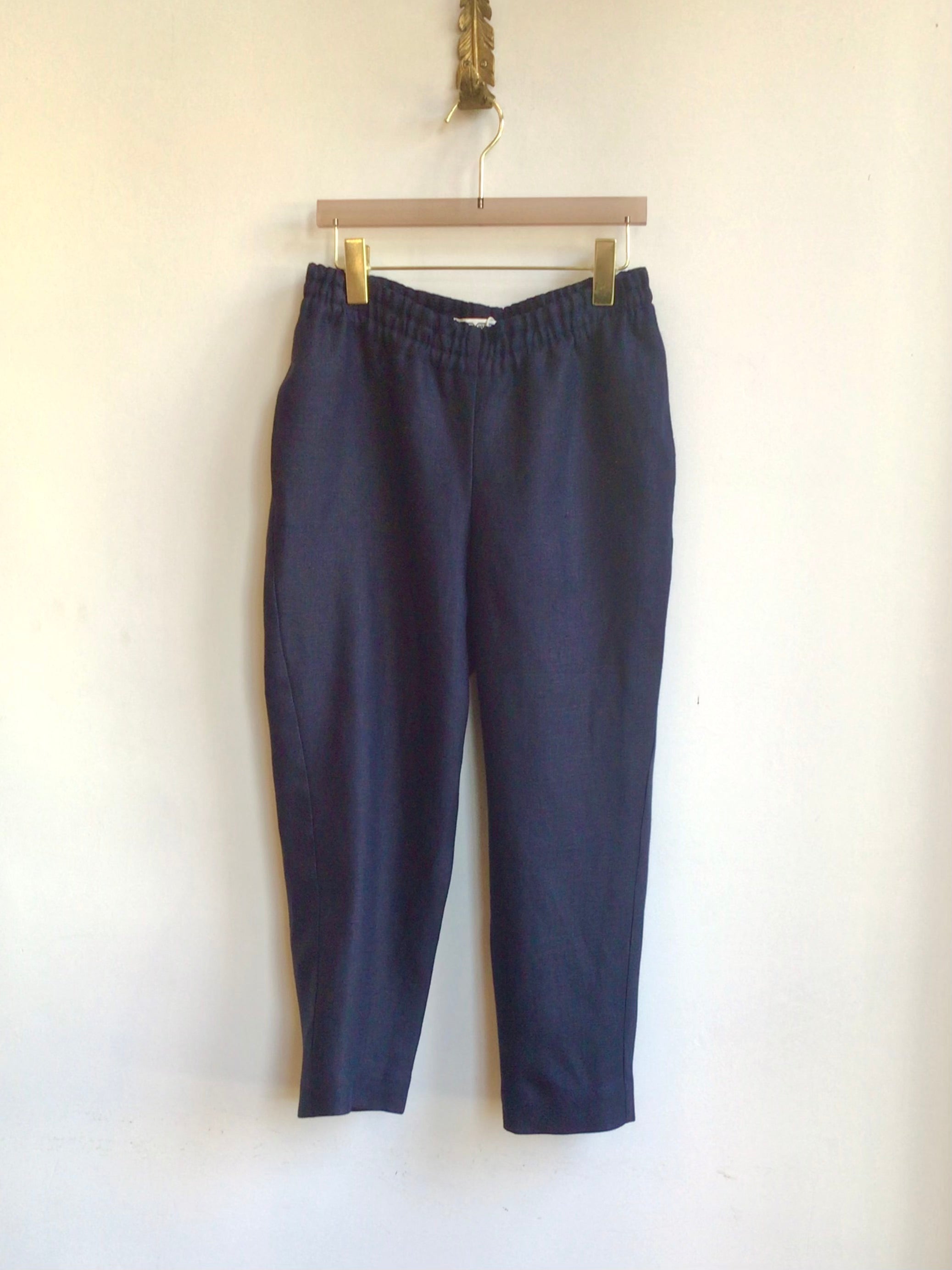 Image of jogger-style pants in navy blue linen