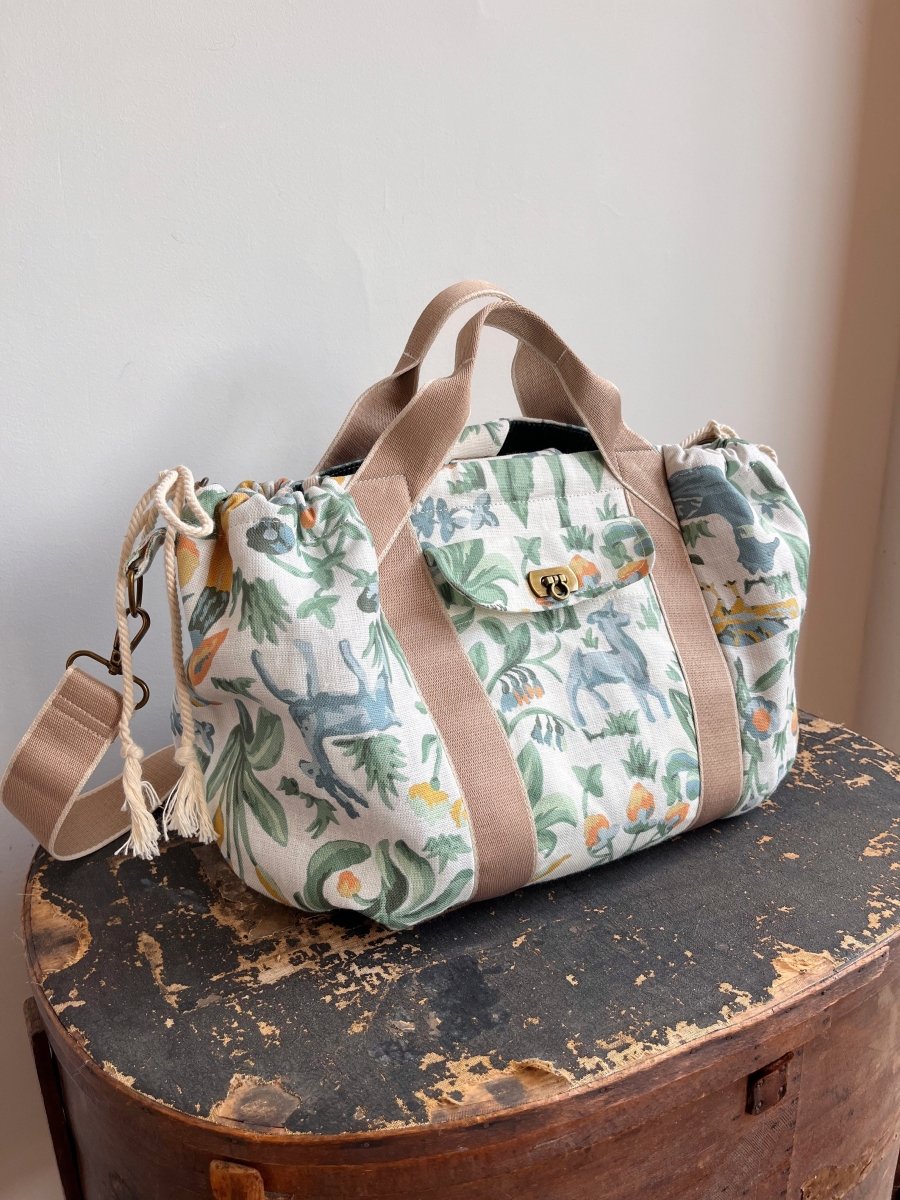Mini Cross - Body Duffel Bag in Pastel Flora & Fauna Print - Made X Hudson